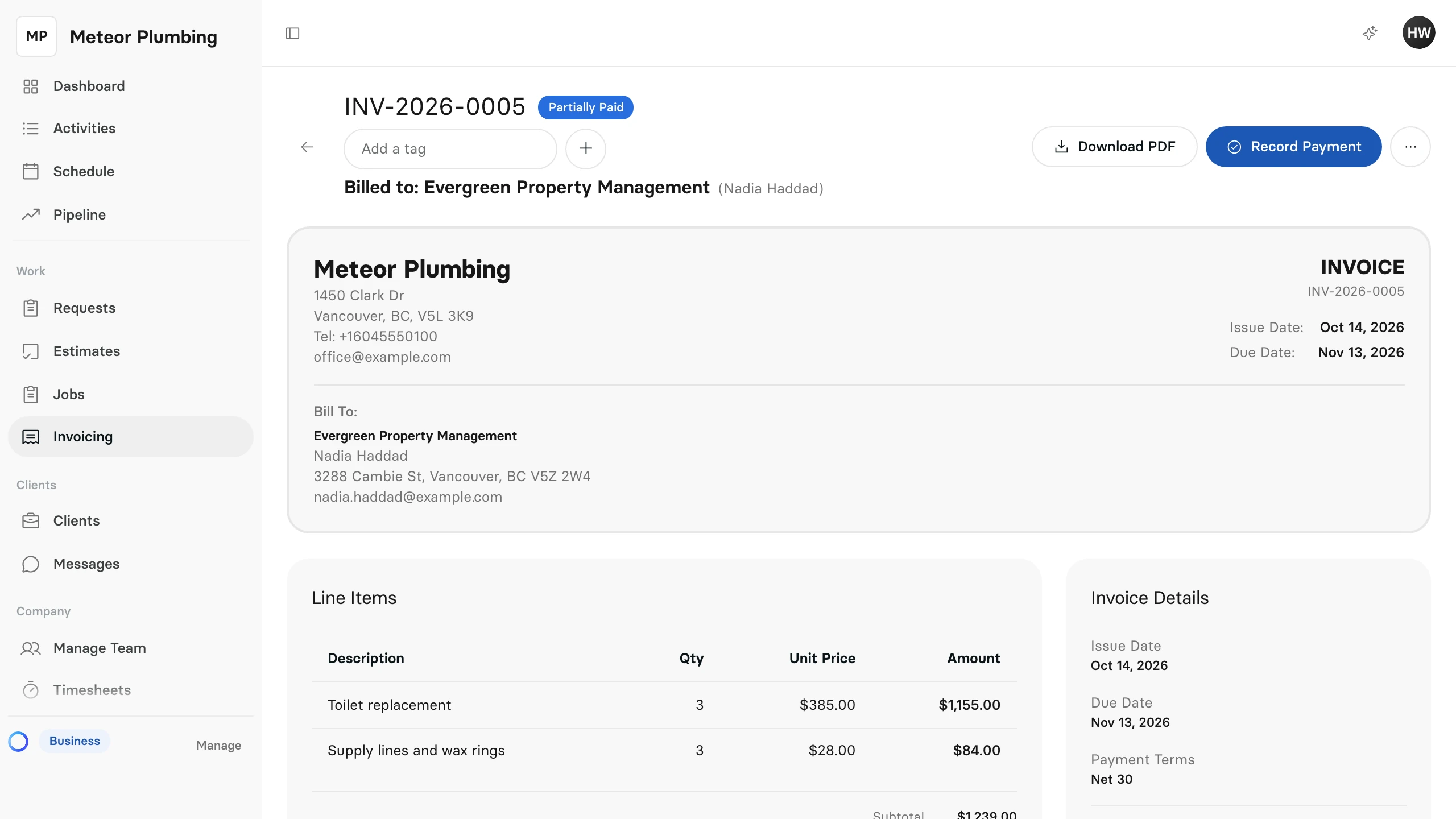 A part-paid invoice for Evergreen Property Management, with its Partially Paid status and the Record Payment button